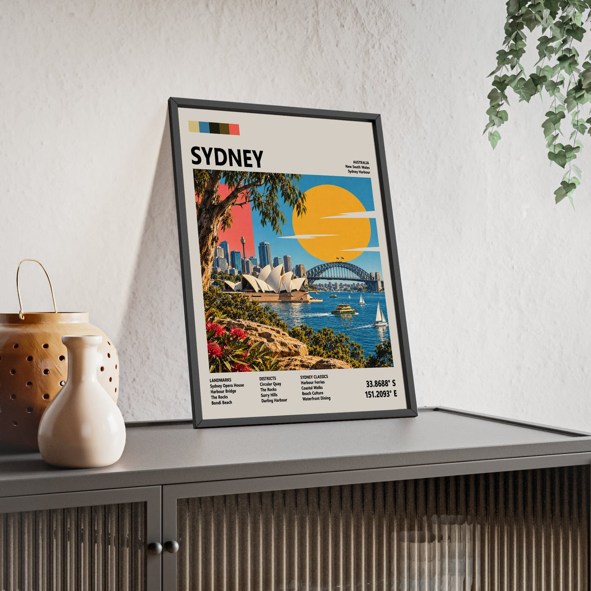 Sydney Mid Century Travel print framed and leaning on a sideboard