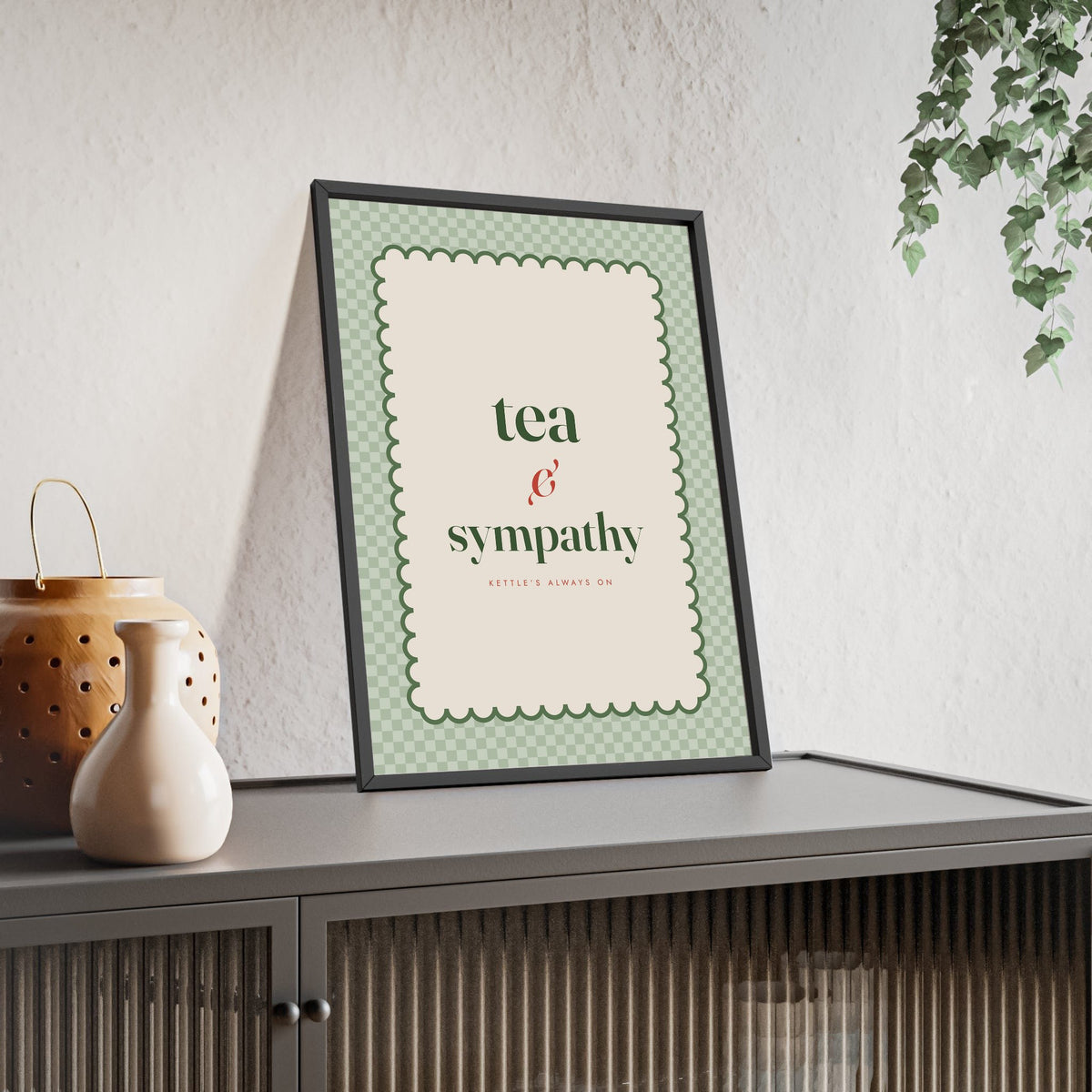 Tea and Sympathy Print framed and leaning on a sideboard