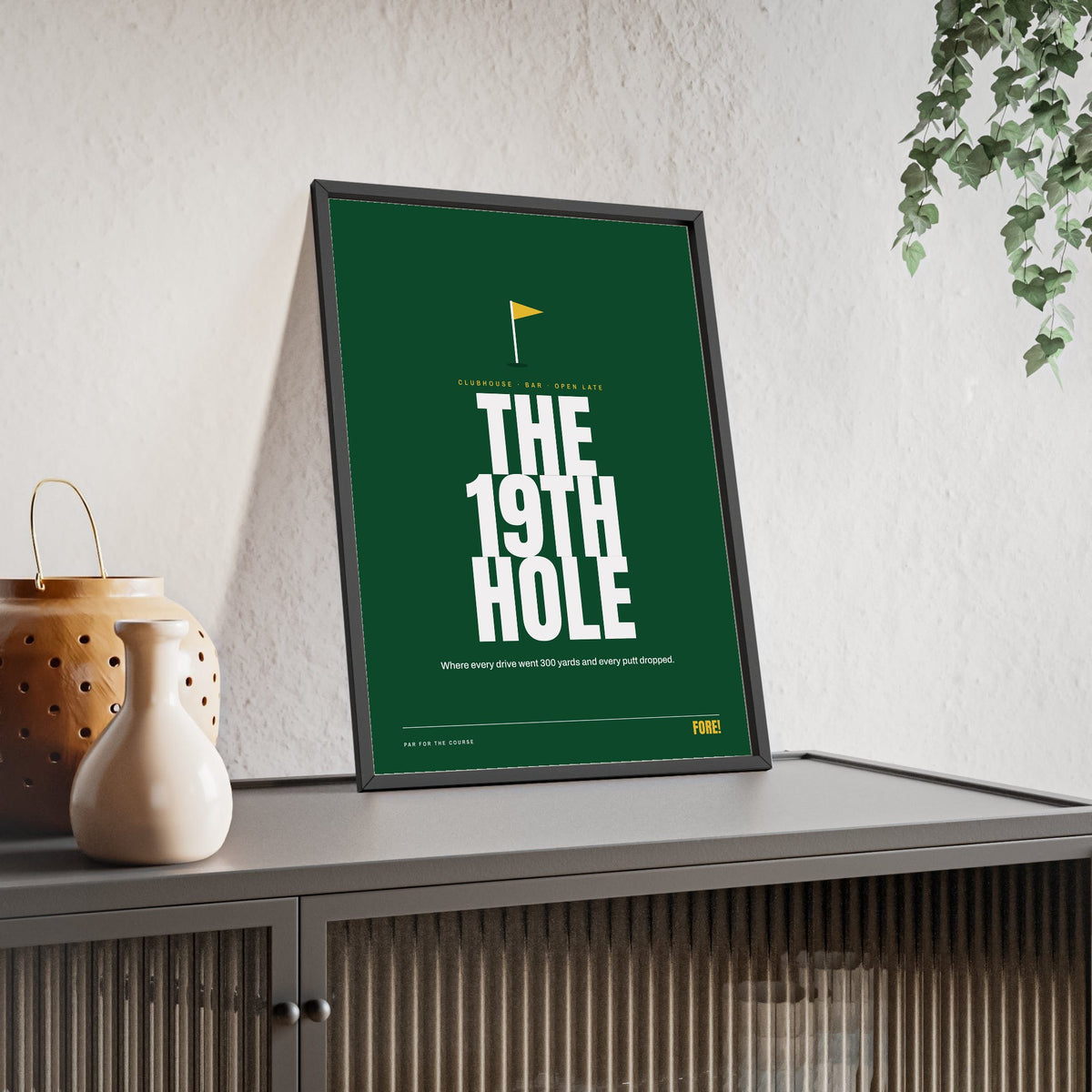 The 19th Hole Golf print framed and leaning on a sideboard