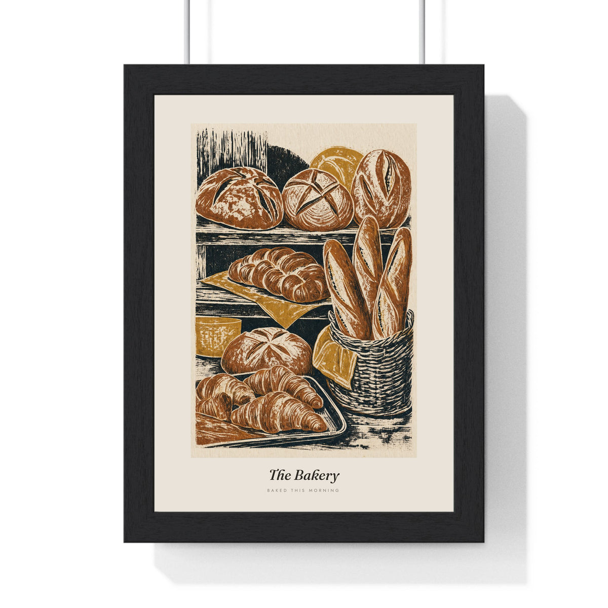 The Bakery Print framed in a black frame, ready to hang
