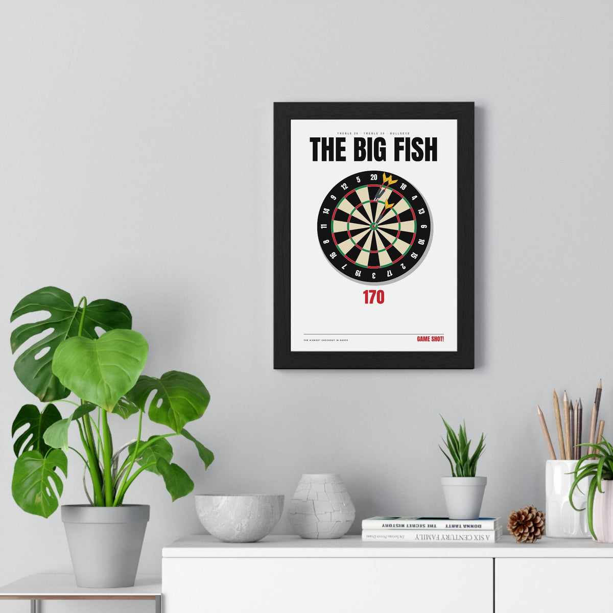 The Big Fish 170 Darts print framed on a living room wall