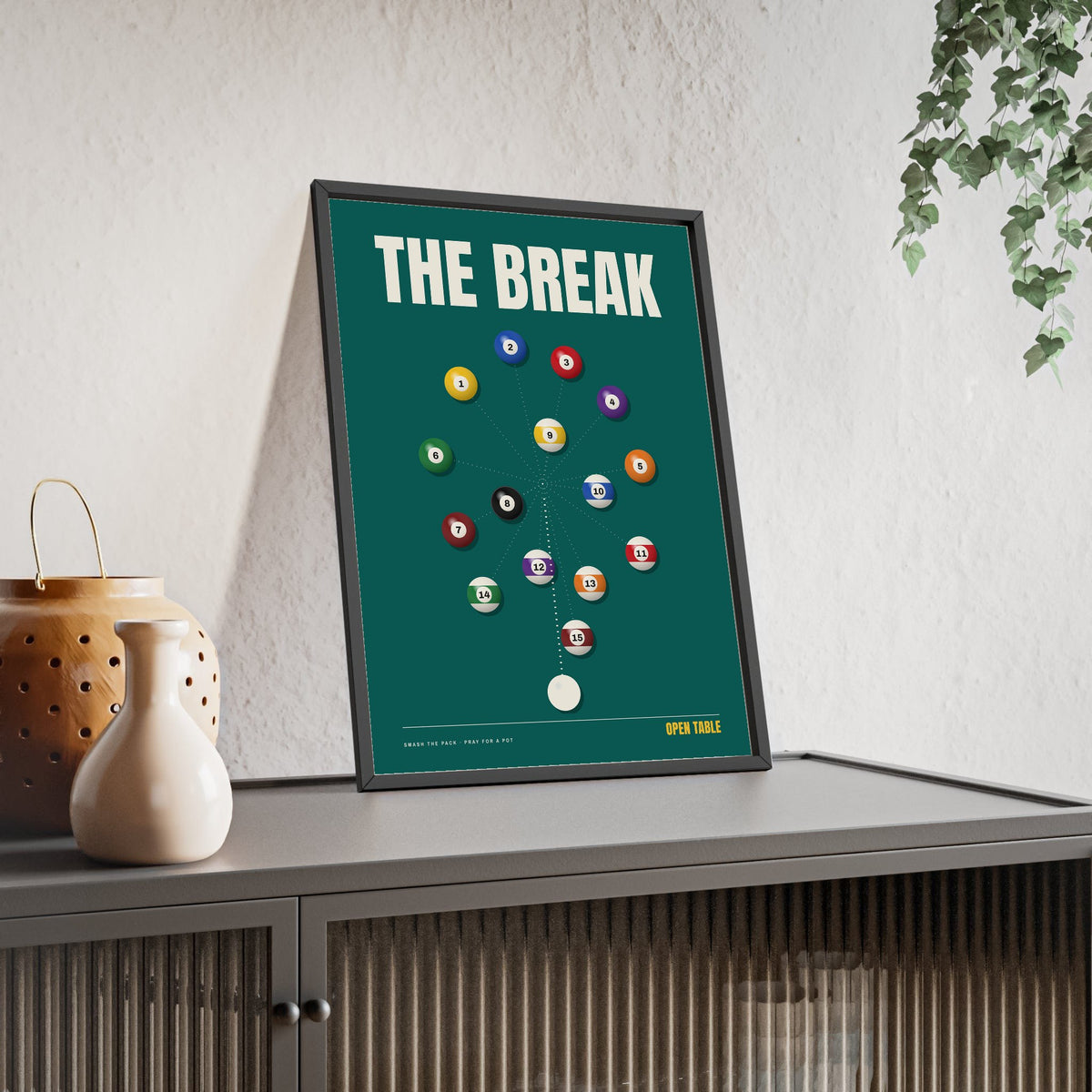 The Break Pool print framed and leaning on a sideboard
