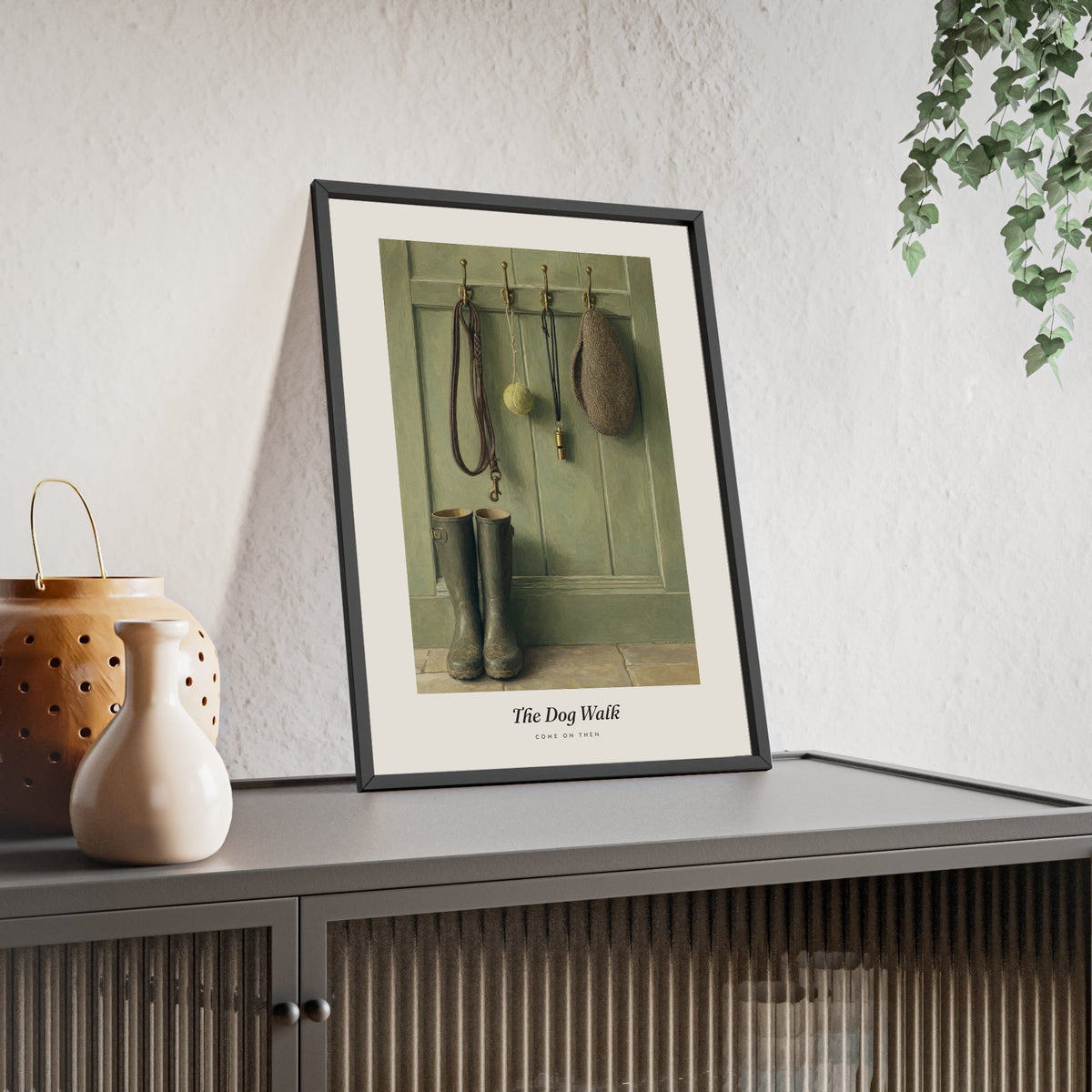 The Dog Walk Print framed and leaning on a sideboard