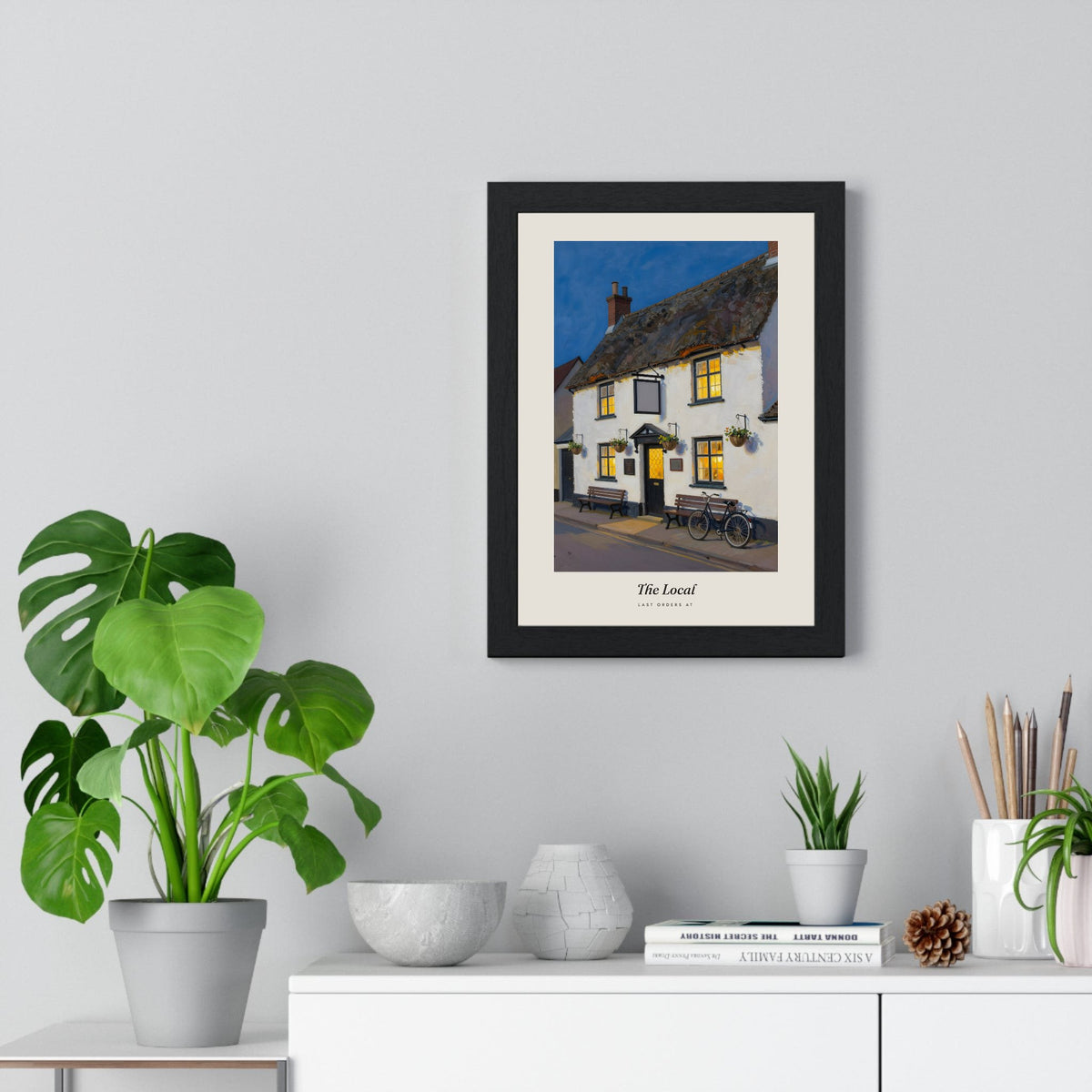 The Local Pub Print framed on a living room wall