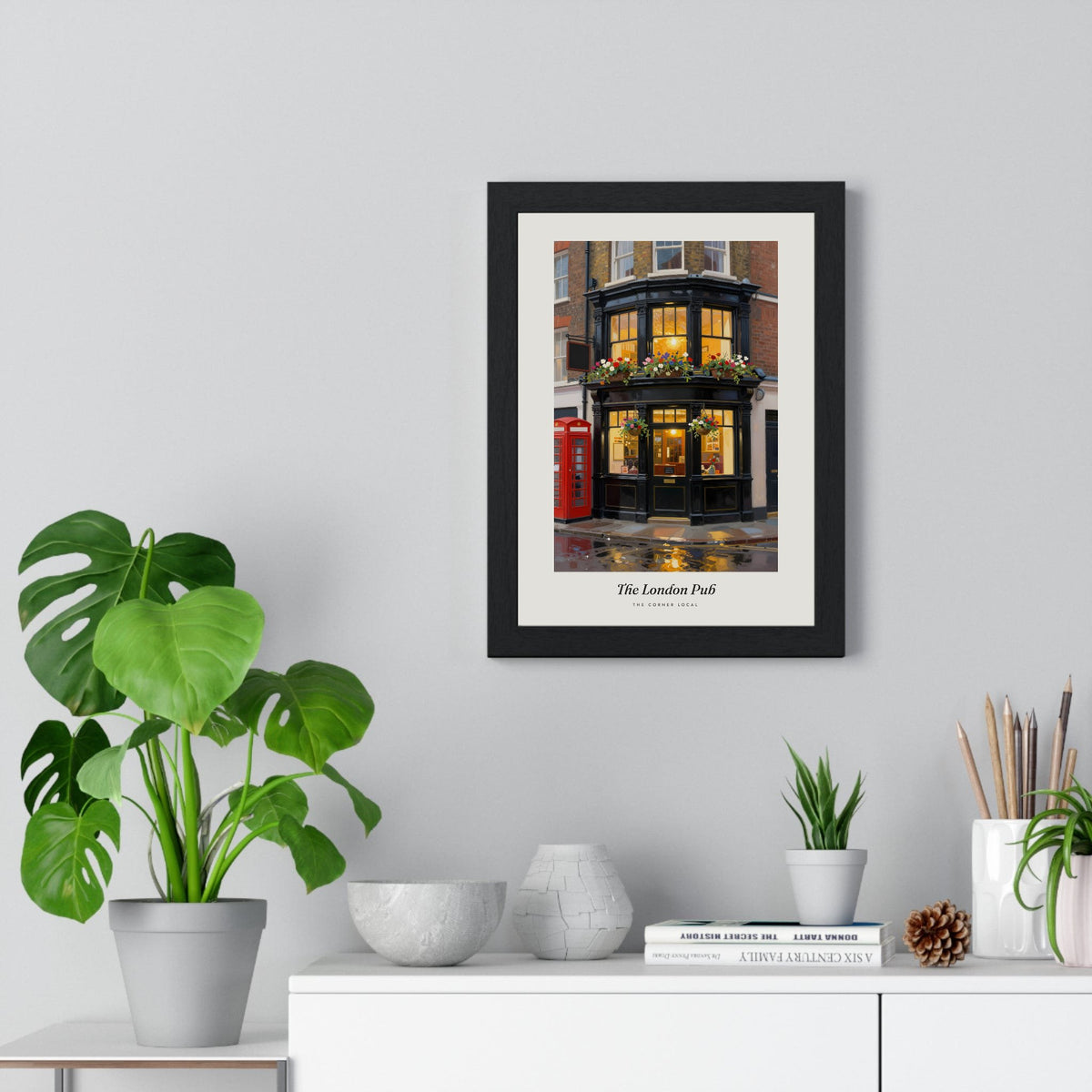 The London Pub Print framed on a living room wall