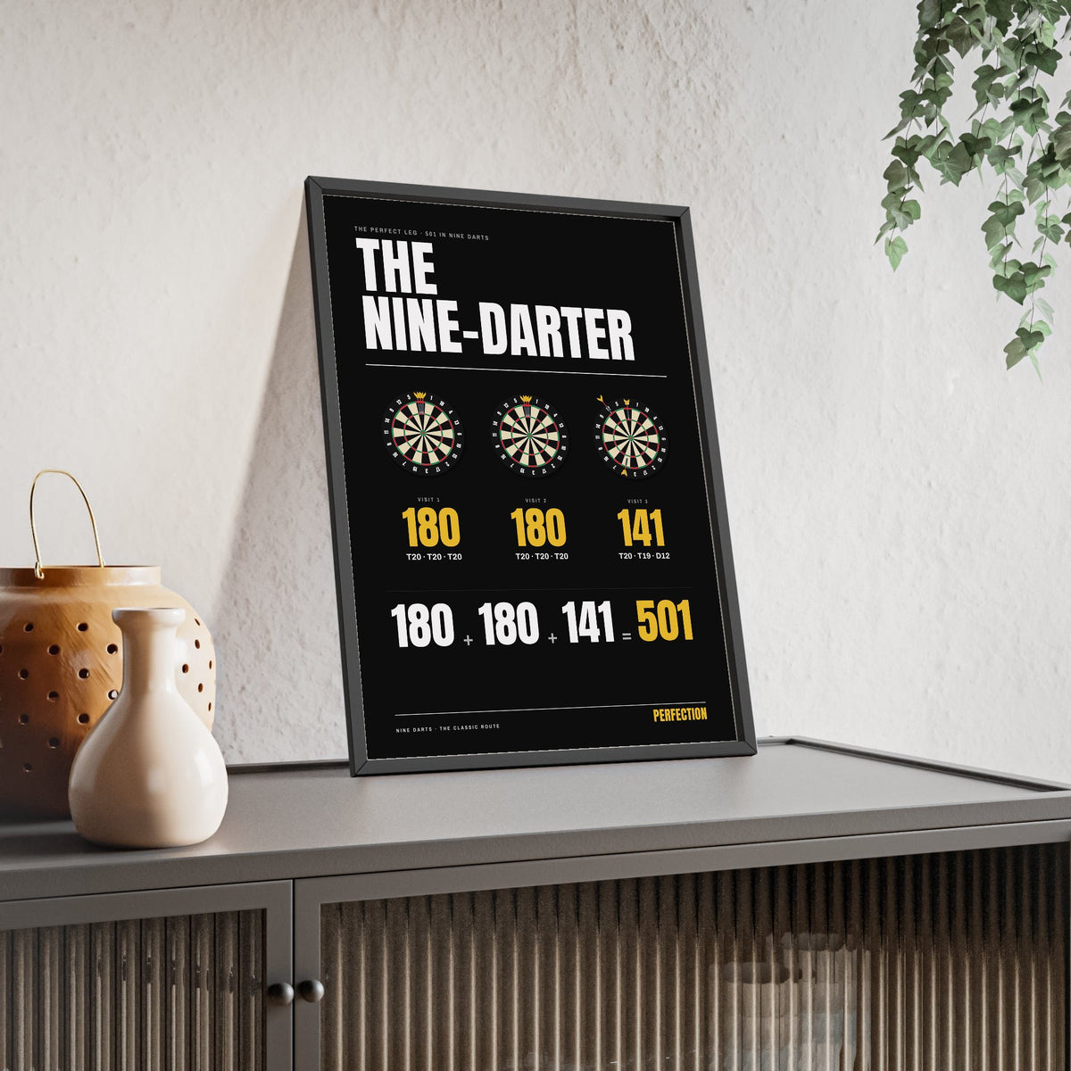 The Nine-Darter Darts print framed and leaning on a sideboard