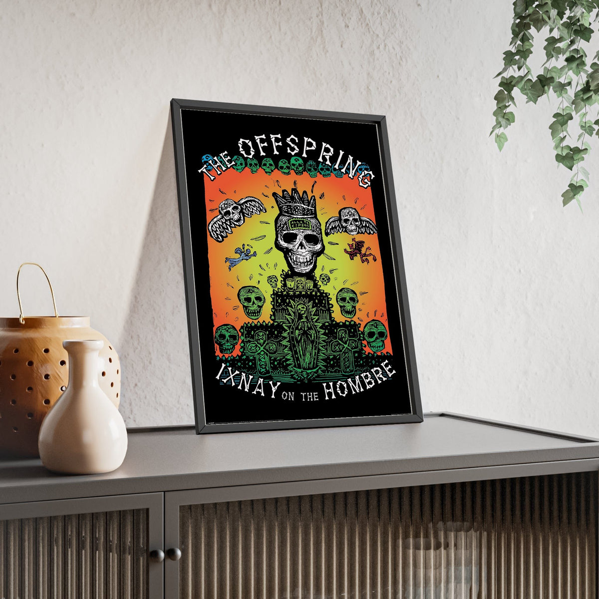The Offspring Ixnay on the Hombre Maxi Poster framed and leaning on a sideboard