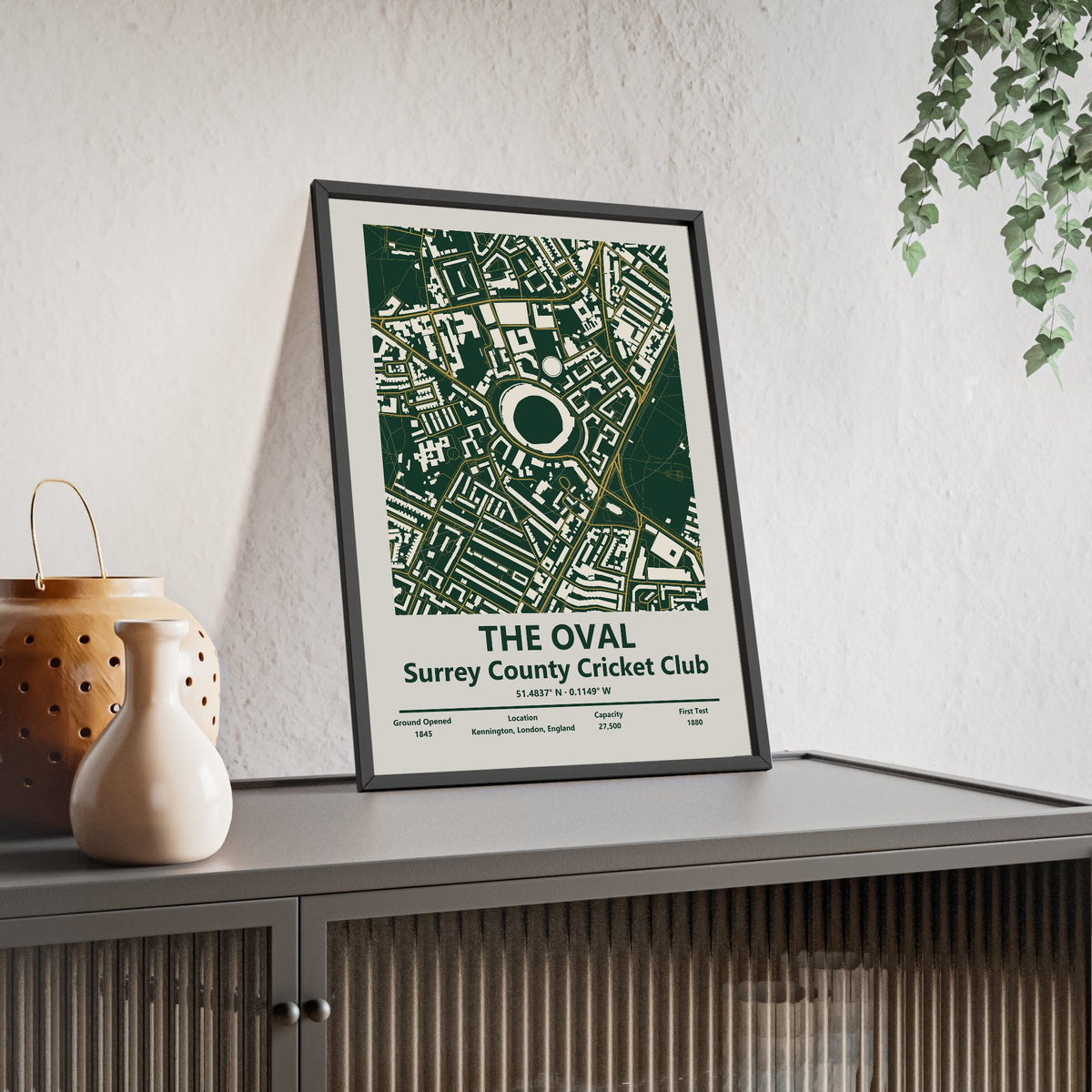 The Oval map print framed and leaning on a sideboard