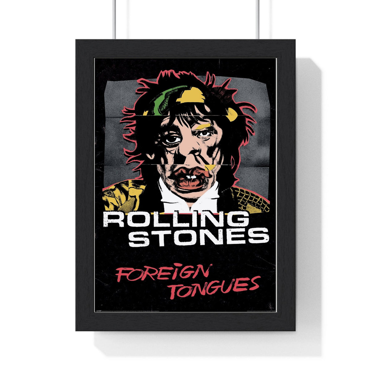 The Rolling Stones Foreign Tongues Maxi Poster framed in a black frame