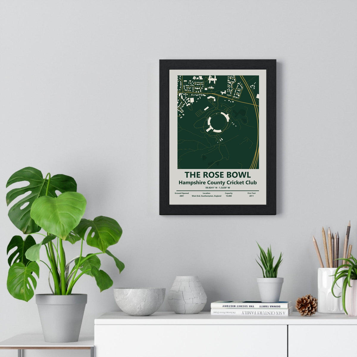 The Rose Bowl map print framed on a living room wall