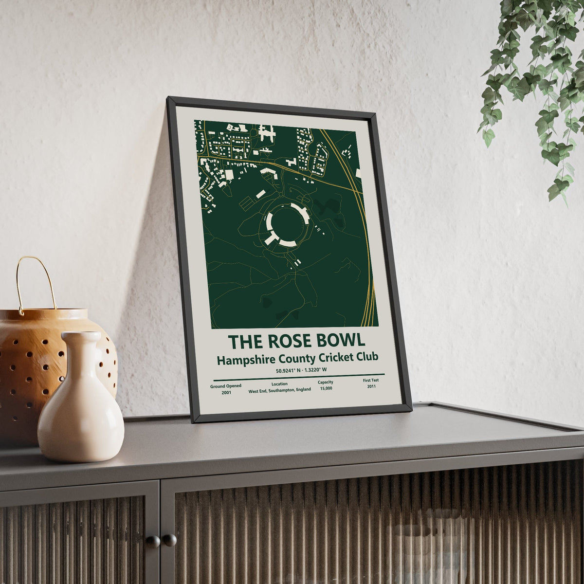 The Rose Bowl map print framed and leaning on a sideboard
