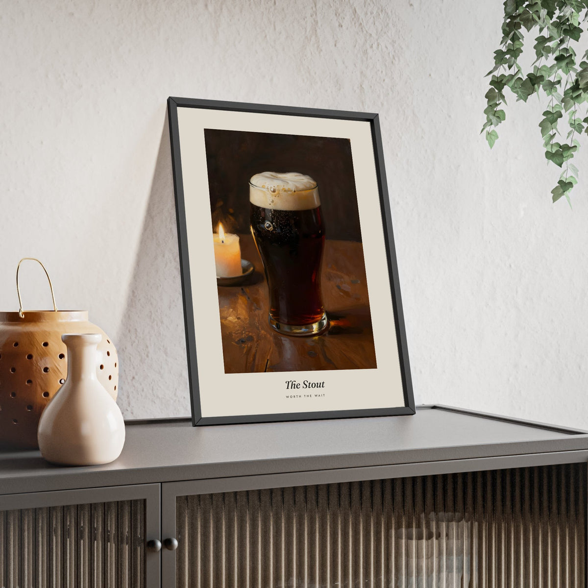 The Stout Print framed and leaning on a sideboard