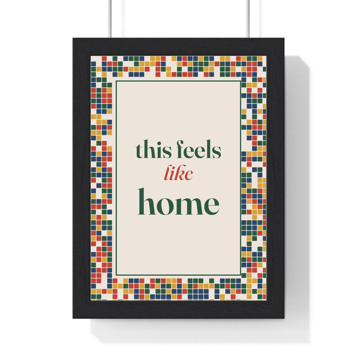 This Feels Like Home Print framed in a black frame, ready to hang