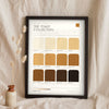 Toast Colour Chart in a black frame propped up on linen
