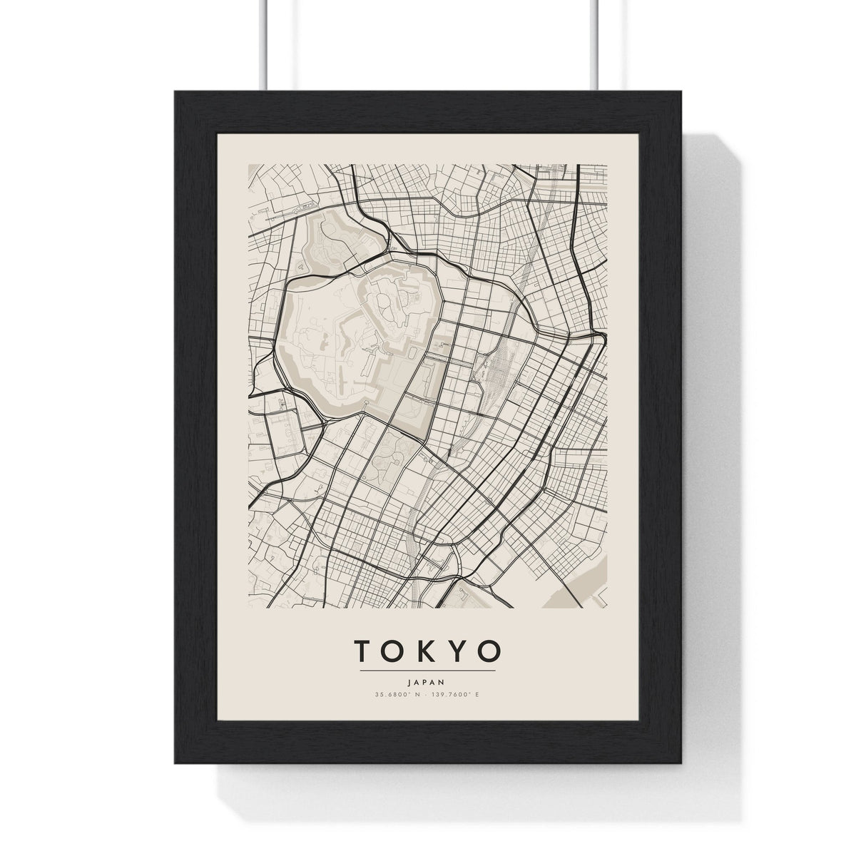 Tokyo street map poster in cream, minimal city map print framed in a black frame