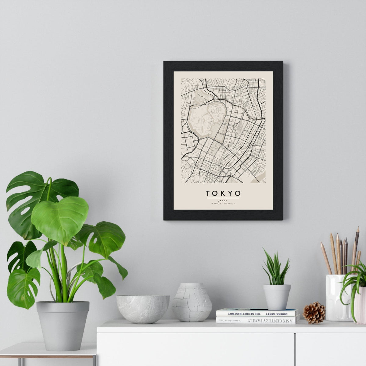Tokyo street map poster in cream, minimal city map print framed on a living room wall