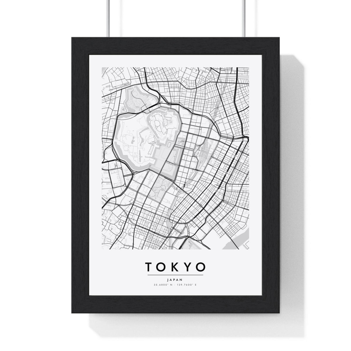 Tokyo street map poster in white, minimal city map print framed in a black frame