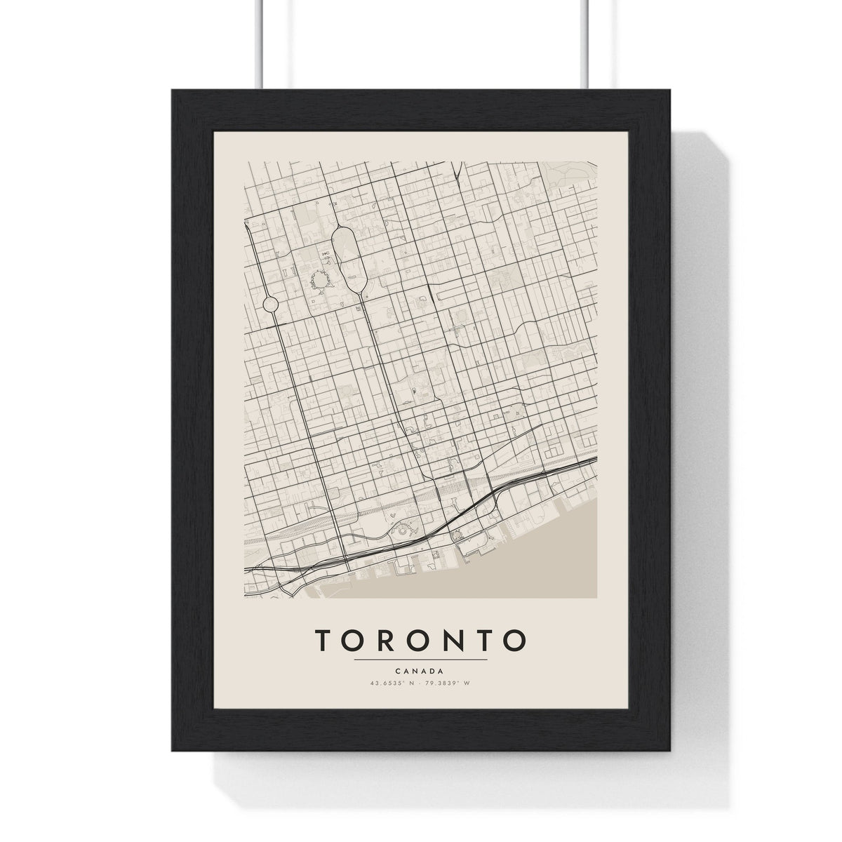 Toronto street map poster in cream, minimal city map print framed in a black frame