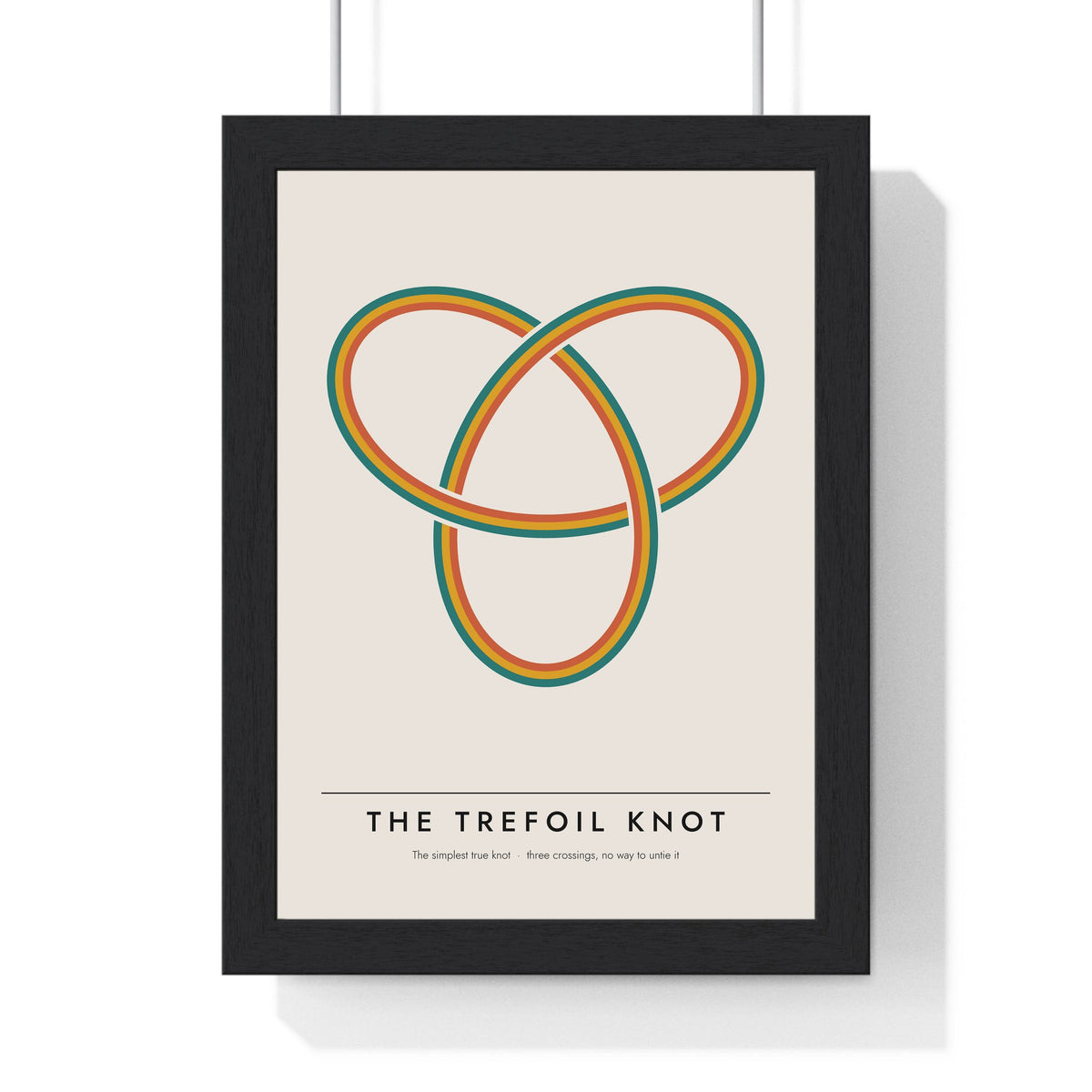 Trefoil Knot print framed in a black frame, ready to hang