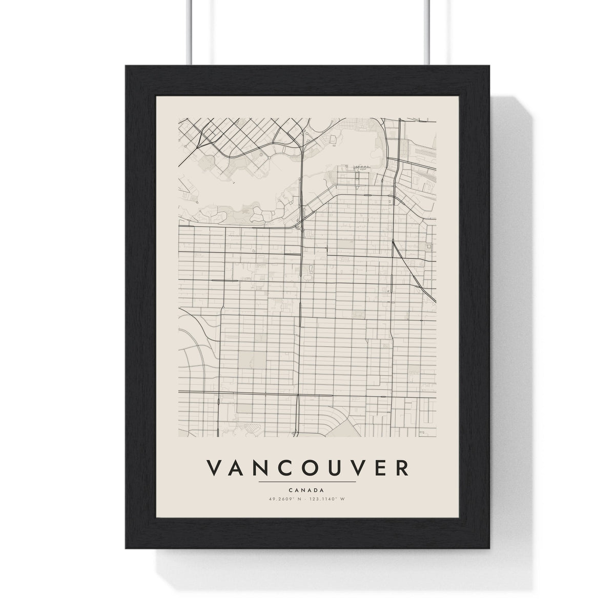 Vancouver street map poster in cream, minimal city map print framed in a black frame