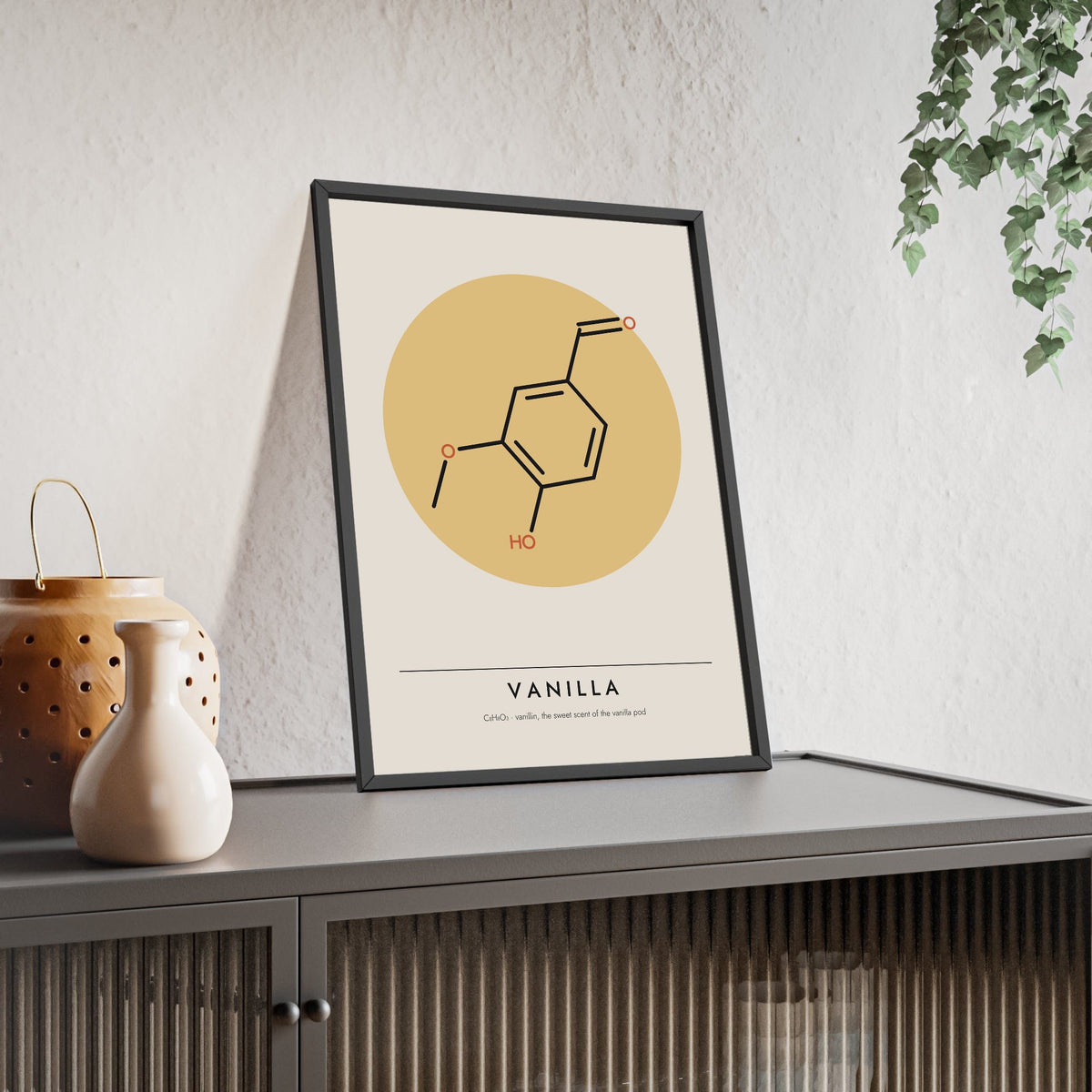 Vanillin Molecule print framed and leaning on a sideboard