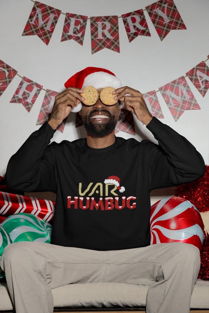 Black t-shirt with VAR Humbug Christmas Jumper Football Parody close-up