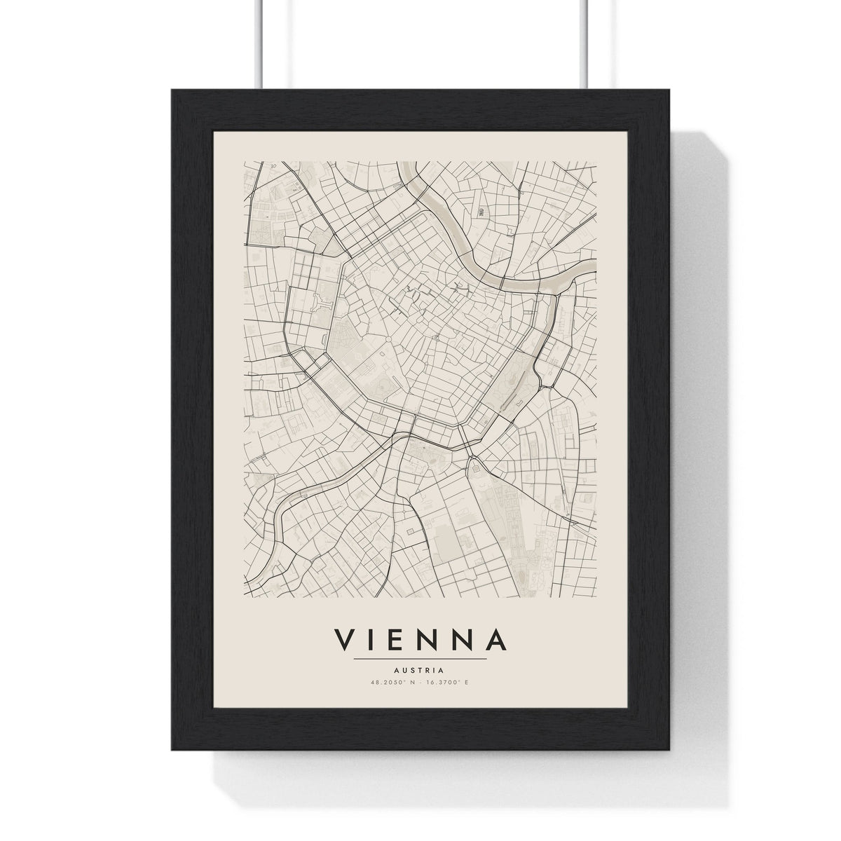 Vienna street map poster in cream, minimal city map print framed in a black frame