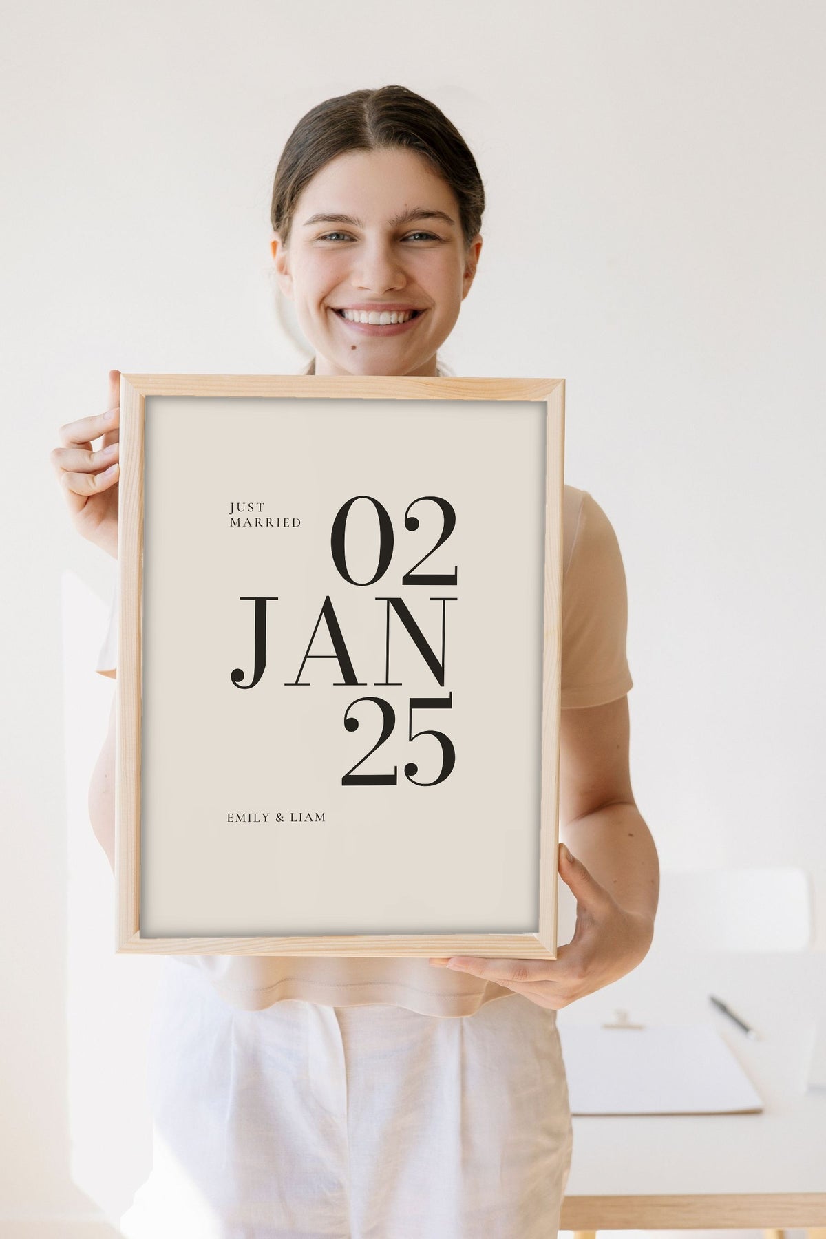 Personalised Wedding Date Print - Lifestyle - held by a smiling woman