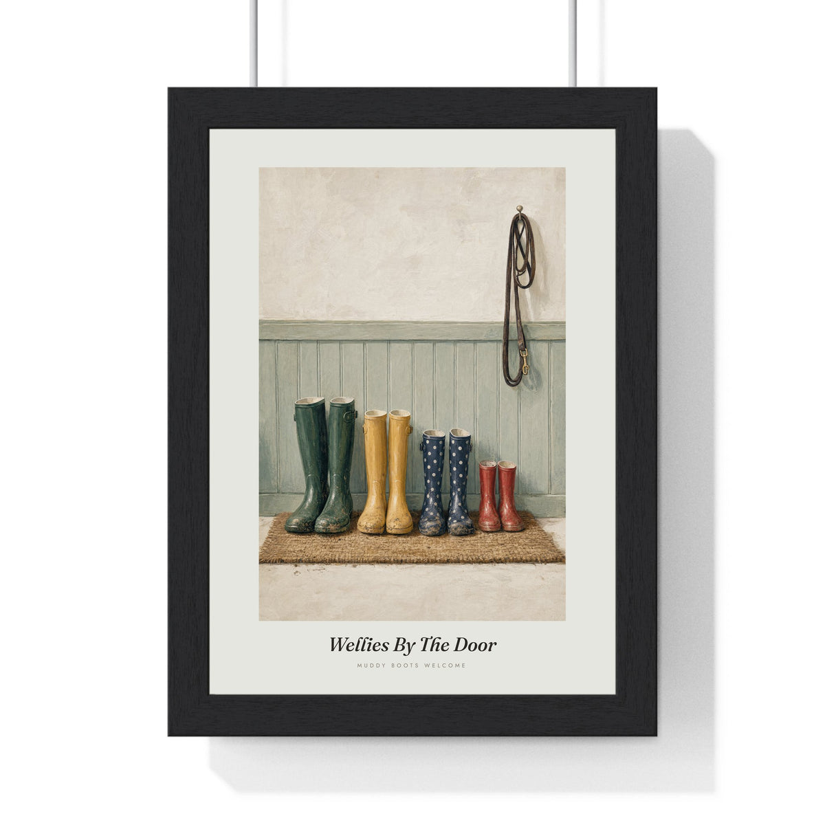 Wellies by the Door Print framed in a black frame, ready to hang