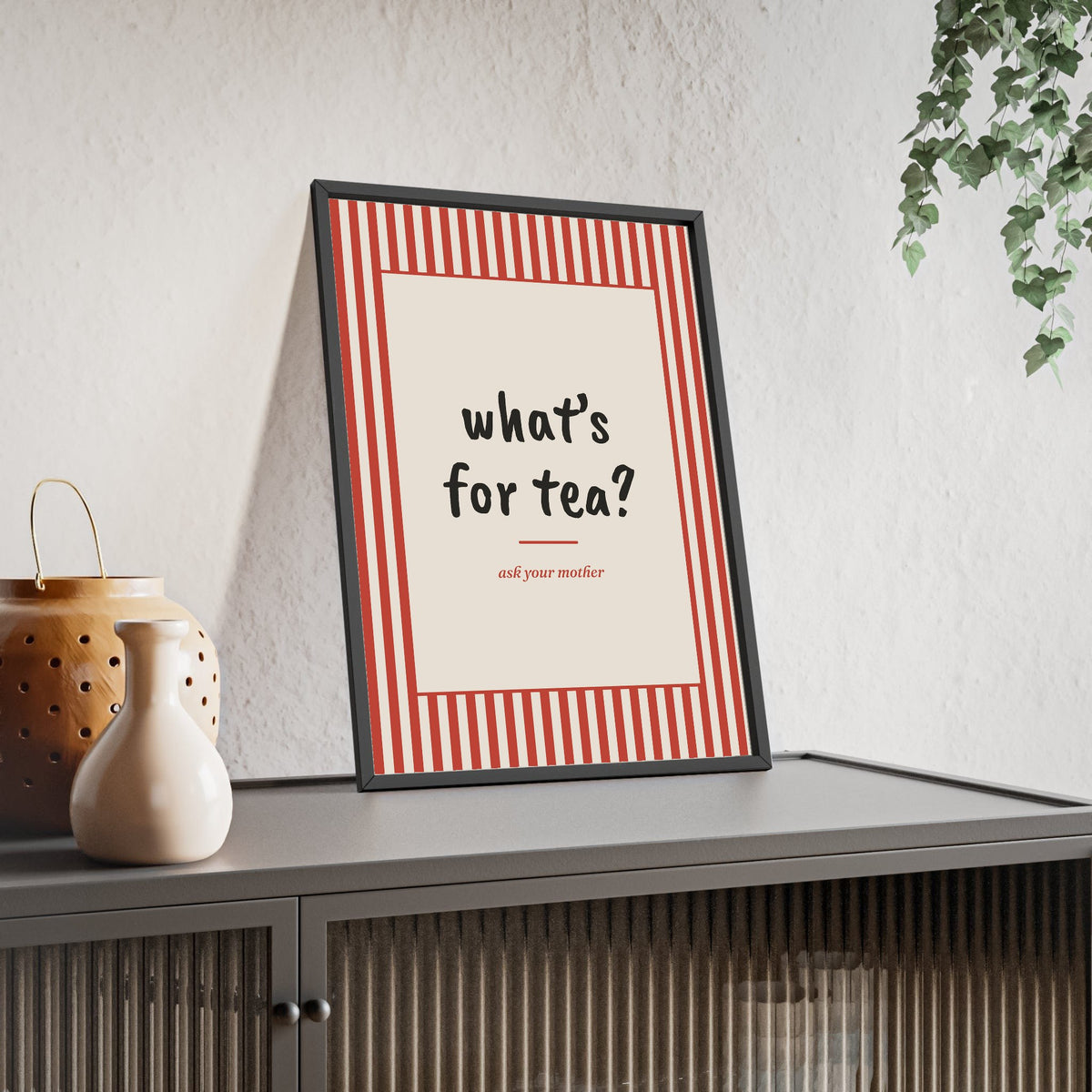 What's For Tea Print framed and leaning on a sideboard