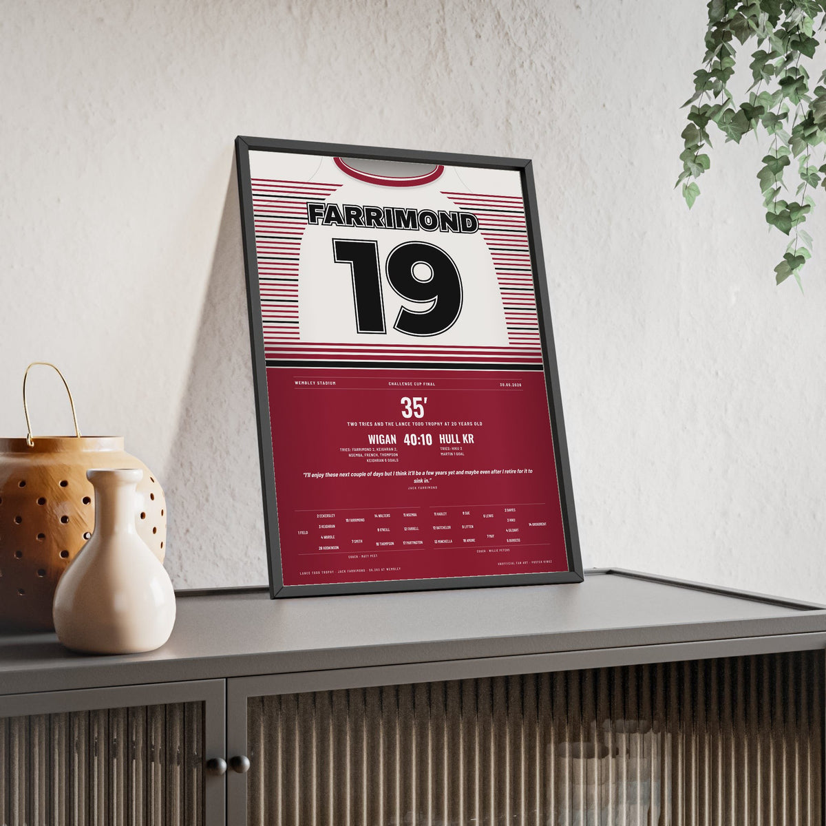 Wigan Warriors Challenge Cup Final 2026 Poster - Jack Farrimond 19 Lance Todd Rugby Print framed and leaning on a sideboard