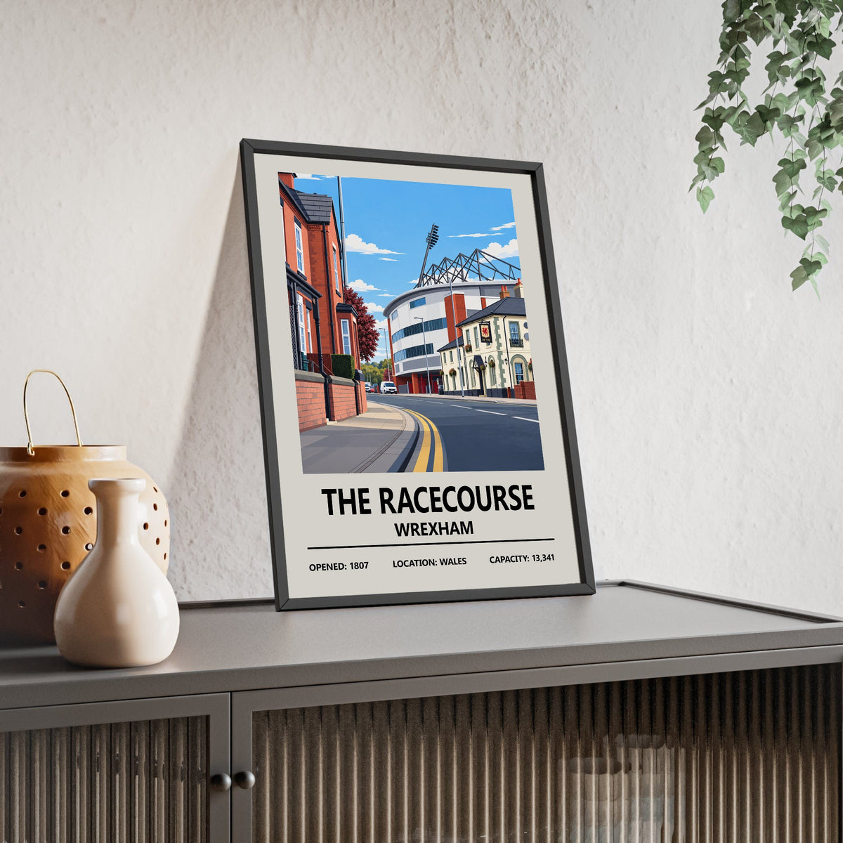 Wrexham The Racecourse Ground print framed and leaning on a sideboard