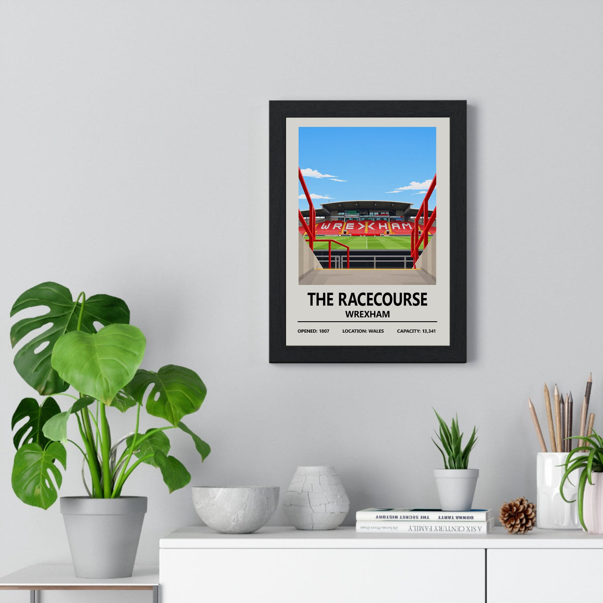 Wrexham The Racecourse Ground print framed on a living room wall