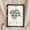 Yorkshire Sayings Print in a black frame propped up on linen