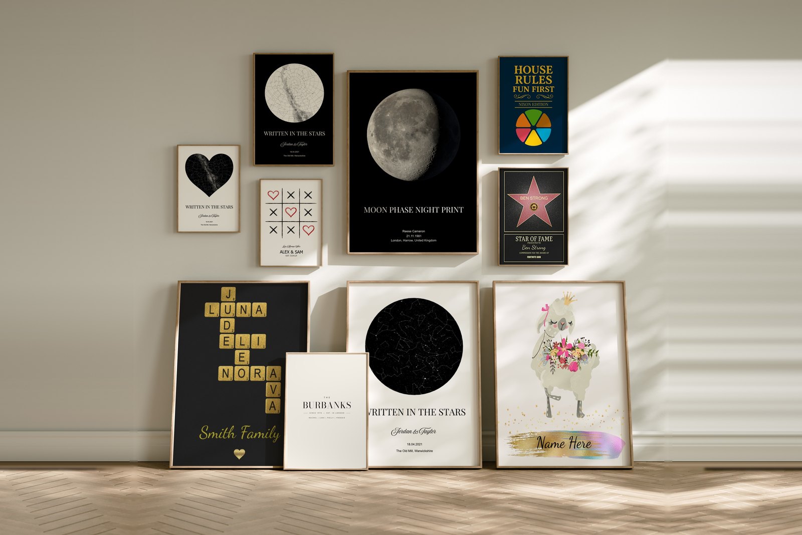 A gallery wall of personalised Poster Kingz prints: star maps, moon phase, family name and Scrabble name prints